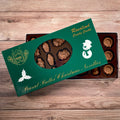 A box of peanut butter filled milk chocolate novelties, presented in a Christmas-themed packaging with snowman and holly designs.